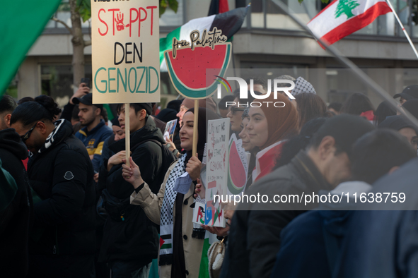 A thousand protesters take part in a protest demanding a ceasefire and opposing ongoing Israeli attacks on Gaza and Lebanon in Duesseldorf,...