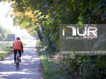 A cyclist rides on the Canal du Midi near Toulouse. Zadists, or development protesters, begin to install a ZAD (Zone to Defend, a militant o...