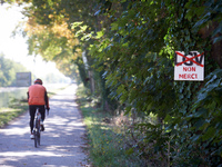 A cyclist rides on the Canal du Midi near Toulouse. Zadists, or development protesters, begin to install a ZAD (Zone to Defend, a militant o...