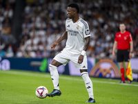 Vinicius Junior of Real Madrid CF is in action with the ball during the La Liga EA Sports 2024/25 football match between Real Madrid CF and...