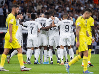 Players of Real Madrid CF (from L to R) Vinicius Junior, Aurelien Tchouameni, Antonio Rudiger, and Kylian Mbappe celebrate a goal during the...