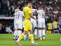 Players of Real Madrid CF (from L to R) Vinicius Junior, Aurelien Tchouameni, Antonio Rudiger, and Kylian Mbappe celebrate a goal during the...