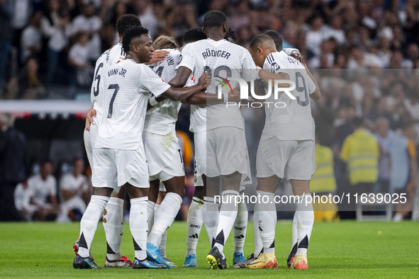 Players of Real Madrid CF (from L to R) Vinicius Junior, Aurelien Tchouameni, Antonio Rudiger, and Kylian Mbappe celebrate a goal during the...