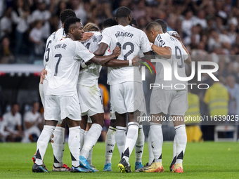 Players of Real Madrid CF (from L to R) Vinicius Junior, Aurelien Tchouameni, Antonio Rudiger, and Kylian Mbappe celebrate a goal during the...