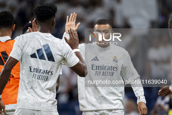 Kylian Mbappe of Real Madrid CF cheers his teammates during the La Liga EA Sports 2024/25 football match between Real Madrid CF and Villarre...