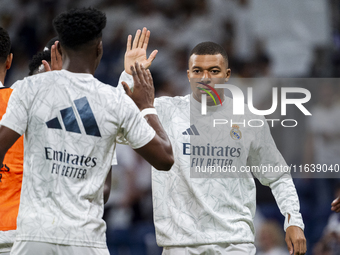 Kylian Mbappe of Real Madrid CF cheers his teammates during the La Liga EA Sports 2024/25 football match between Real Madrid CF and Villarre...