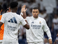 Kylian Mbappe of Real Madrid CF cheers his teammates during the La Liga EA Sports 2024/25 football match between Real Madrid CF and Villarre...