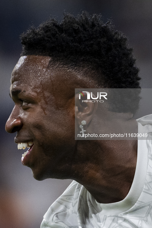 Vinicius Junior of Real Madrid CF smiles during the La Liga EA Sports 2024/25 football match between Real Madrid CF and Villarreal CF at Est...