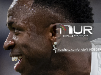 Vinicius Junior of Real Madrid CF smiles during the La Liga EA Sports 2024/25 football match between Real Madrid CF and Villarreal CF at Est...