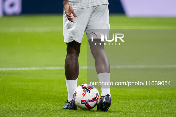 A detail of Vinicius Junior of Real Madrid CF shoes while he plays with the ball during the warm-up for the La Liga EA Sports 2024/25 footba...