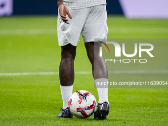 A detail of Vinicius Junior of Real Madrid CF shoes while he plays with the ball during the warm-up for the La Liga EA Sports 2024/25 footba...