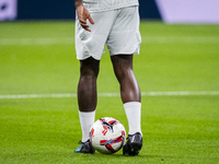 A detail of Vinicius Junior of Real Madrid CF shoes while he plays with the ball during the warm-up for the La Liga EA Sports 2024/25 footba...