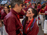 A couple from Colla Castellera Jove de Barcelona participates in the Concurs de Castells competition in Tarragona, Spain, on October 5, 2024...