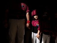 A child waits to participate in the Concurs de Castells competition in Tarragona, Spain, on October 5, 2024. (