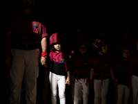 A child waits to participate in the Concurs de Castells competition in Tarragona, Spain, on October 5, 2024. (