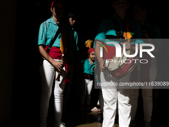 A child waits to participate in the Concurs de Castells competition in Tarragona, Spain, on October 5, 2024. (