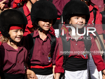 Children from the Colla Jove de Castellers de Sitges participate in the Concurs de Castells competition in Tarragona, Spain, on October 5, 2...