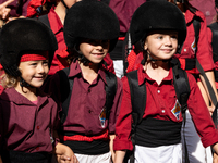 Children from the Colla Jove de Castellers de Sitges participate in the Concurs de Castells competition in Tarragona, Spain, on October 5, 2...