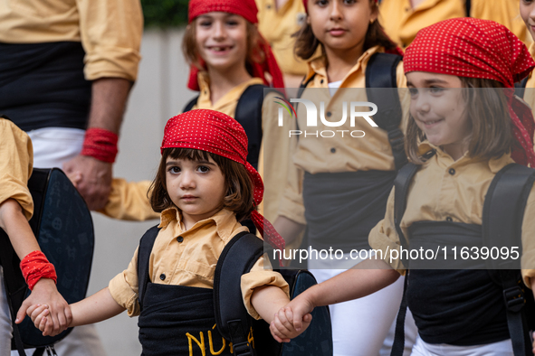 Children participate in the Concurs de Castells competition in Tarragona, Spain, on October 5, 2024. 