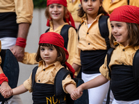 Children participate in the Concurs de Castells competition in Tarragona, Spain, on October 5, 2024. (