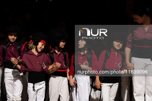 Children from the Colla Jove de Castellers de Sitges participate in the Concurs de Castells competition in Tarragona, Spain, on October 5, 2...