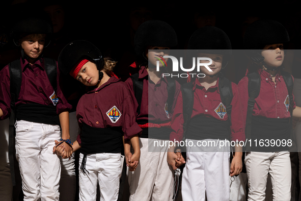 Children from the Colla Jove de Castellers de Sitges participate in the Concurs de Castells competition in Tarragona, Spain, on October 5, 2...