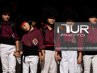 Children from the Colla Jove de Castellers de Sitges participate in the Concurs de Castells competition in Tarragona, Spain, on October 5, 2...