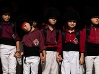 Children from the Colla Jove de Castellers de Sitges participate in the Concurs de Castells competition in Tarragona, Spain, on October 5, 2...