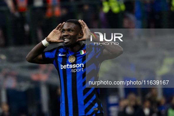 Marcus Thuram celebrates after scoring a goal during the Serie A football match between FC Internazionale and Torino FC at Stadio Giuseppe M...