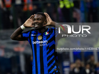 Marcus Thuram celebrates after scoring a goal during the Serie A football match between FC Internazionale and Torino FC at Stadio Giuseppe M...