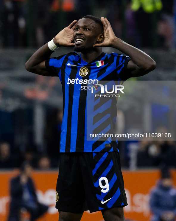 Marcus Thuram celebrates after scoring a goal during the Serie A football match between FC Internazionale and Torino FC at Stadio Giuseppe M...