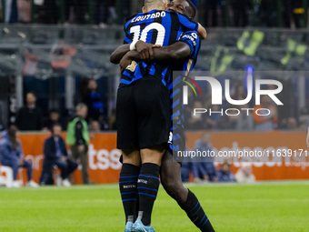 Lautaro Martinez and Marcus Thuram celebrate after scoring a goal during the Serie A football match between FC Internazionale and Torino FC...