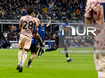 Marcus Thuram celebrates after scoring a goal during the Serie A football match between FC Internazionale and Torino FC at Stadio Giuseppe M...