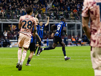 Marcus Thuram celebrates after scoring a goal during the Serie A football match between FC Internazionale and Torino FC at Stadio Giuseppe M...