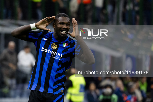 Marcus Thuram celebrates after scoring a goal during the Serie A football match between FC Internazionale and Torino FC at Stadio Giuseppe M...