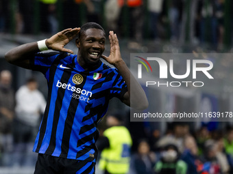 Marcus Thuram celebrates after scoring a goal during the Serie A football match between FC Internazionale and Torino FC at Stadio Giuseppe M...