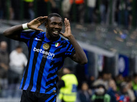 Marcus Thuram celebrates after scoring a goal during the Serie A football match between FC Internazionale and Torino FC at Stadio Giuseppe M...