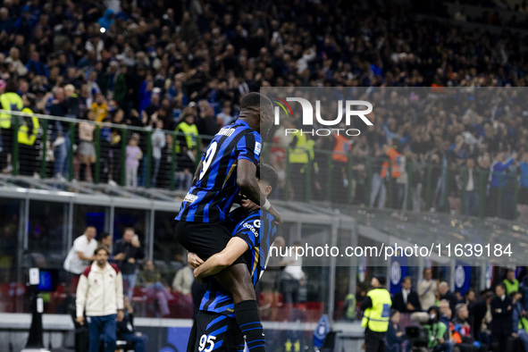 Marcus Thuram and Alessandro Bastoni celebrate after scoring a goal during the Serie A football match between FC Internazionale and Torino F...