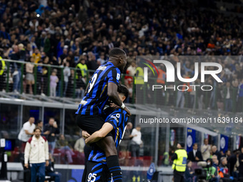 Marcus Thuram and Alessandro Bastoni celebrate after scoring a goal during the Serie A football match between FC Internazionale and Torino F...