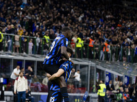 Marcus Thuram and Alessandro Bastoni celebrate after scoring a goal during the Serie A football match between FC Internazionale and Torino F...