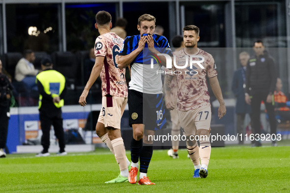 Davide Frattesi plays during the Serie A match between FC Internazionale and Torino FC in Milano, Italy, on October 5, 2024, at Stadio Giuse...