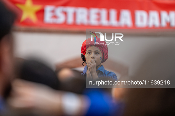 Children of Castellers de Berga participate in the Concurs de Castells competition in Tarragona, Spain, on October 5, 2024. 