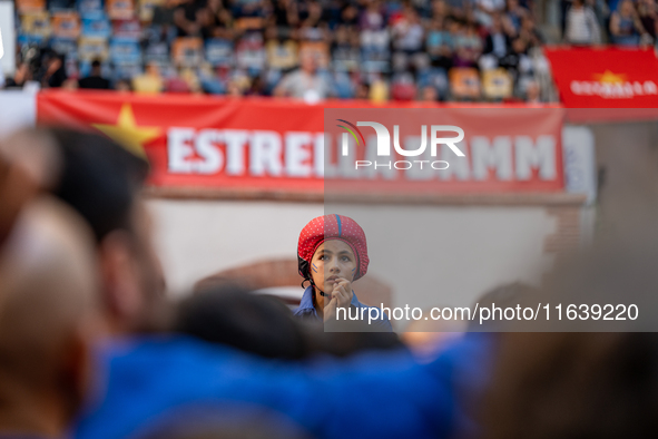 Children of Castellers de Berga participate in the Concurs de Castells competition in Tarragona, Spain, on October 5, 2024. 