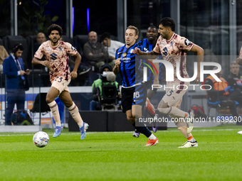 Davide Frattesi plays during the Serie A match between FC Internazionale and Torino FC in Milano, Italy, on October 5, 2024, at Stadio Giuse...