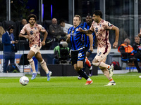 Davide Frattesi plays during the Serie A match between FC Internazionale and Torino FC in Milano, Italy, on October 5, 2024, at Stadio Giuse...