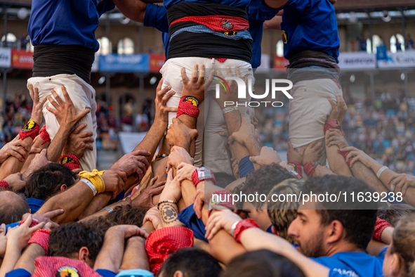 Castellers de Berga participate in the Concurs de Castells competition in Tarragona, Spain, on October 5, 2024. 