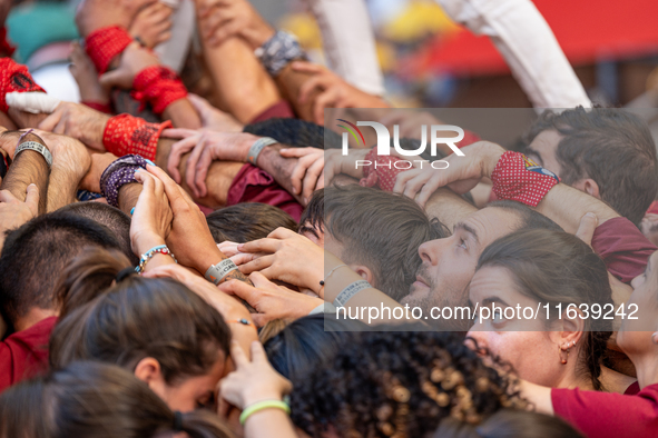 A group holds up a human tower during the Concurs de Castells competition in Tarragona, Spain, on October 5, 2024. 