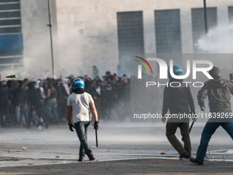 Clashes with the police and pro-Palestine demonstrations occur during the pro-Palestinian demonstration calling for an end to Israeli attack...