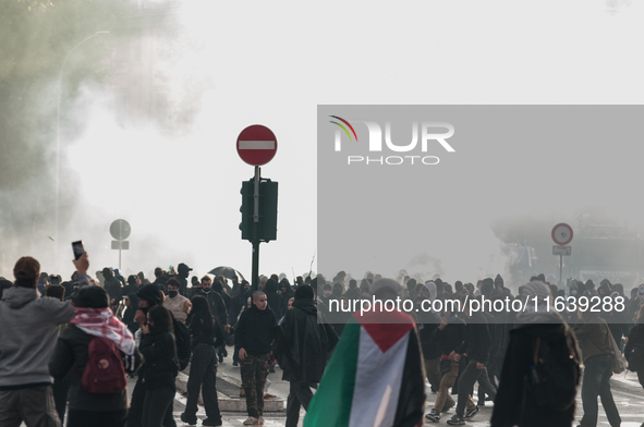 Clashes with the police and pro-Palestine demonstrations occur during the pro-Palestinian demonstration calling for an end to Israeli attack...