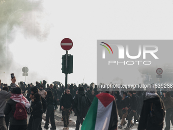 Clashes with the police and pro-Palestine demonstrations occur during the pro-Palestinian demonstration calling for an end to Israeli attack...